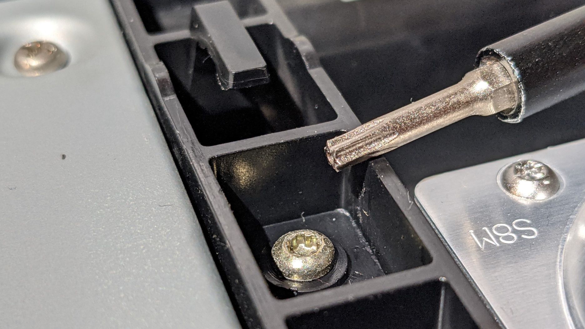 torx screw inside console