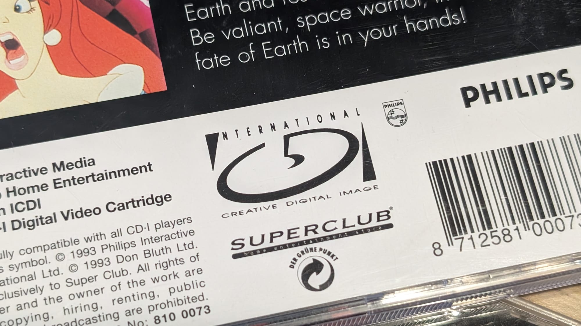 ICDI's logo on the back cover of 'Space Ace'.